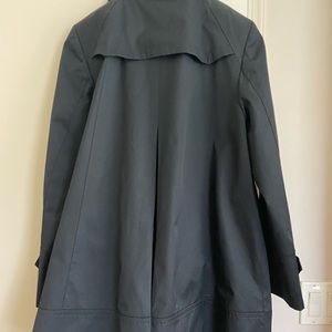 Women rain coat.Size 14.